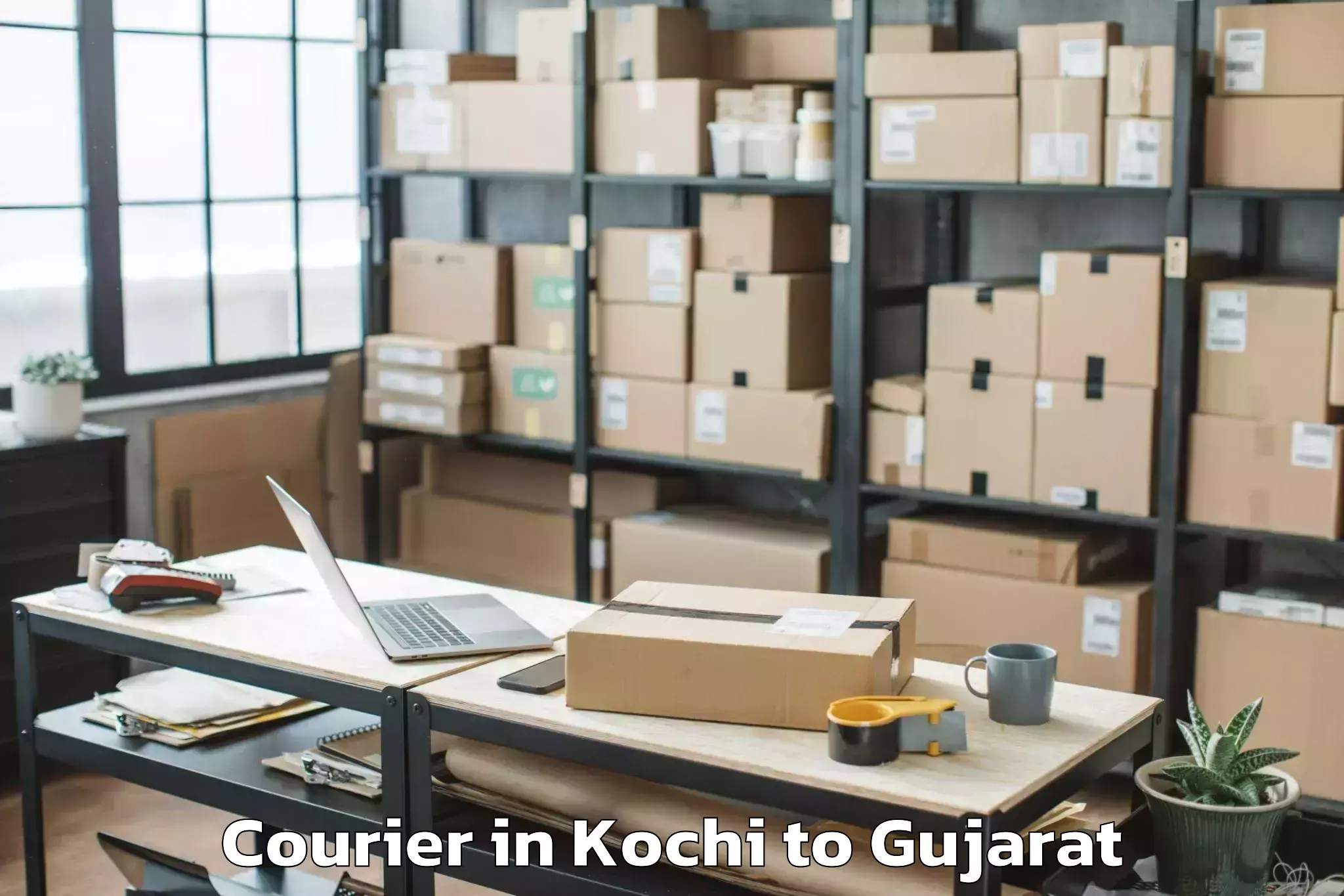 Kochi to Balasinor Courier Booking